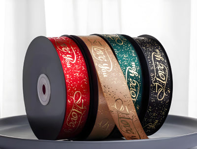 Assorted ribbon widths and textures (satin, grosgrain) for creative packaging.